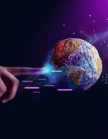 World Technology Concepts. Metaverse, Web3 and Blockchain. Global Network and Data Exchange. Worldwide Business. Hand Touching to Interact with the Globe